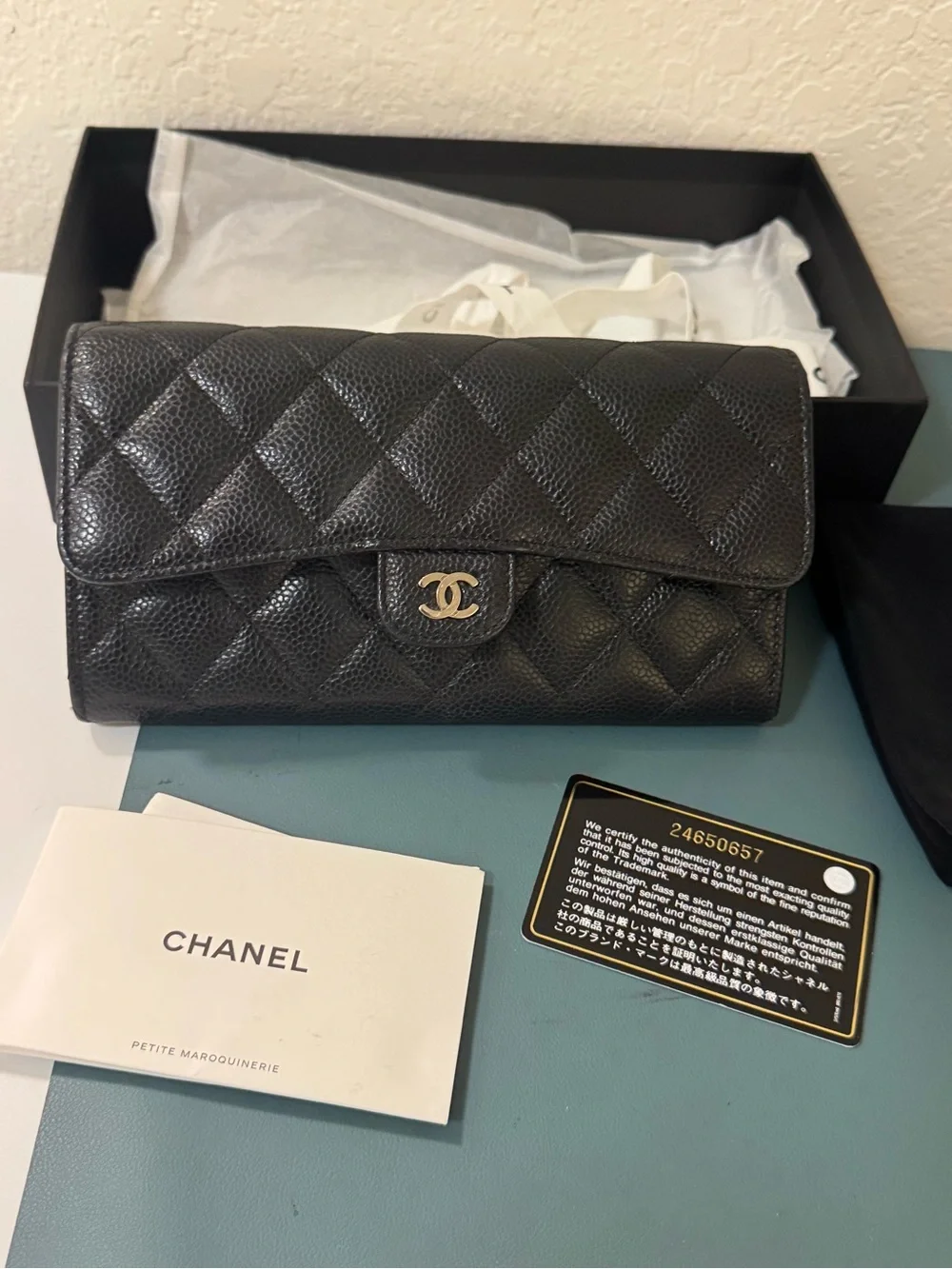 CHANEL Black Quilted Caviar Leather Wallet with Gold CC Lock